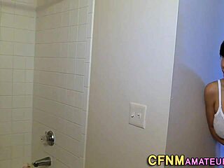 this busty babe is giving an amazing handjob in cfnm style