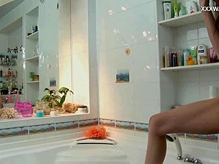 dasha pleasures herself in the shower intimately