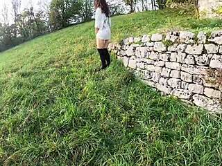 beautiful curly girl strips naked for neighbors in nature