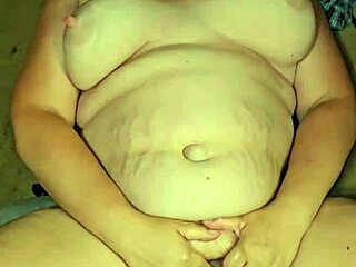 Husband Pisses On His Whore Wife's Big Tits In This Raw Fetish Video Scene