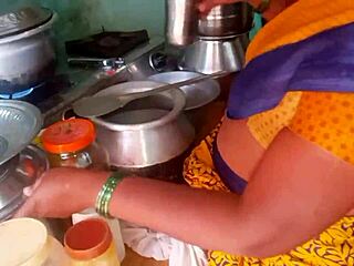 Watch this hot desi bhabhi cooking up steamy homemade action in the kitchen with her roommate!