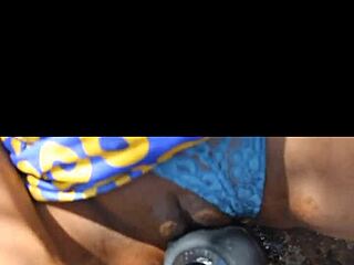 In a quiet evening an ebony woman enjoys a solo date with relaxing vibes