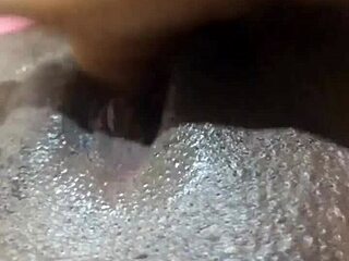 Is that black wet pussy masturbating solo?