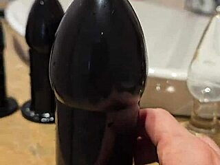 Large sextoy anal fuck with redhead slut