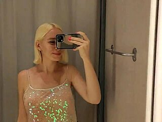 Risky dildo play in public fitting room