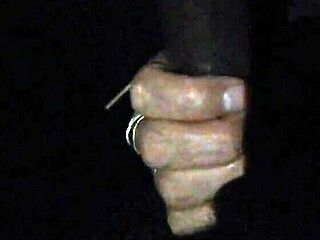 sucking on a big lollipop