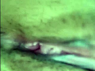 Asian woman spreads legs, uses toy in intriguing video