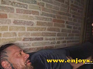 Inked Brunette in Group Tattoo Session