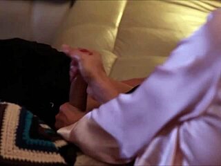 Want to see this MILF giving a handjob under the covers?