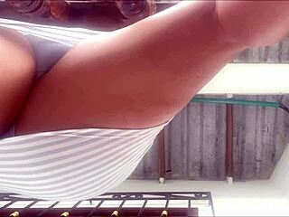 intriguing footage of beautiful women changing in outdoor dressing area at beach