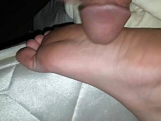 Cum shot lands on feet during intense session. It covers every toe perfectly.