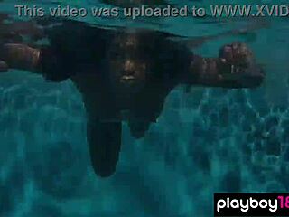 naked ebony milf ana foxxx gently touches her natural hairy area while relaxing under the water