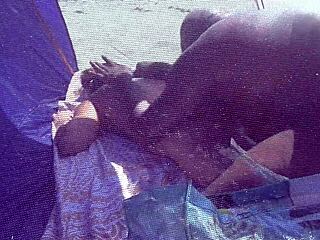 amateur milf enjoys interracial sex on caribbean nude beach while husband films voyeurs watch