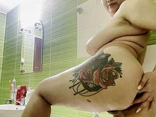 Shower time for big boobs and shaved pussy with tattoos