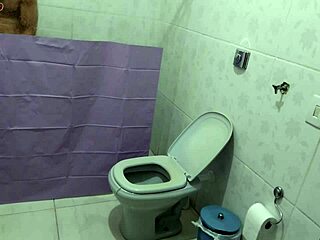 mature latina housewife puts up a curtain in the bathroom just to watch the young man shower