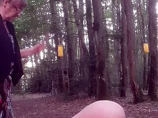 Outdoor femdom session with face sitting and wet BDSM play in the forest