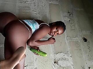 Black Teen Teases Her Huge Pussy With Massive Cucumber In Homemade Striptease