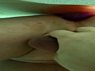 Dominant wife in fishnets forces husband to pound her ass with huge monster cock dildo in amateur anal session.