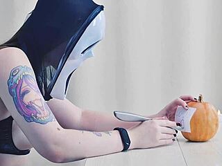 Whoa, Check Out This Sexy Ghostface Doing Erotic Pumpkin Carving for Trick or Treat Fun!
