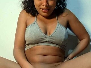 Colombian brunette with big clit masturbates solo using vibrator on tight wet pussy until squirting twice