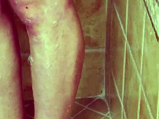 charming blonde girl taking a hot shower