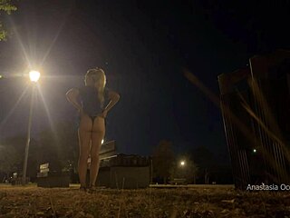 Flashing tits and pussy while changing outfit naked in public park at night!