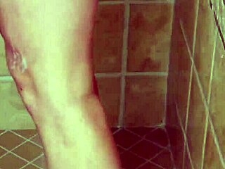 charming blonde girl taking a hot shower