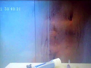 Hidden cam catches german wife fingering to cum in steamy shower