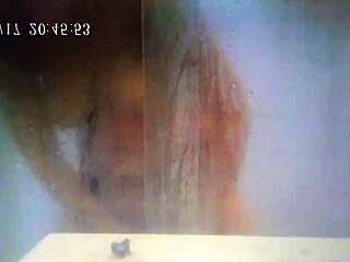Hidden cam catches german wife fingering to cum in steamy shower