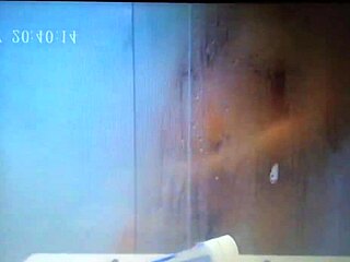 Hidden cam catches german wife fingering to cum in steamy shower