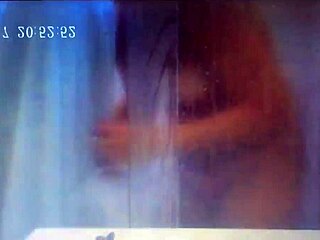 Hidden cam catches german wife fingering to cum in steamy shower