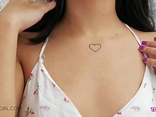 Petite 18+ beauty flaunts perfect body on sofa