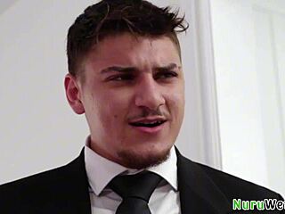 Stunning Busty Brunette Prepares Client for Slippery Nuru Massage