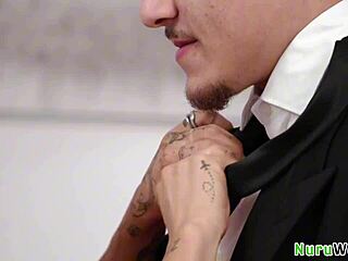 Stunning Busty Brunette Prepares Client for Slippery Nuru Massage