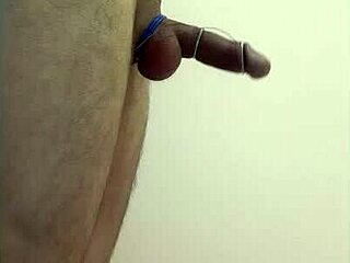 Exotic dancer in cage achieves intense solo orgasm with toys