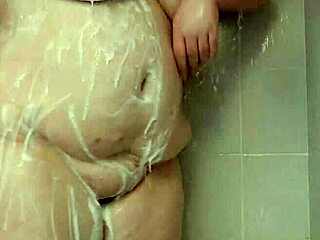 bbw brunette teases big tits in shower