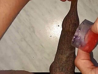 Watch me drip wax on my tattooed foreskin!
