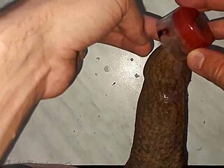 Watch me drip wax on my tattooed foreskin!