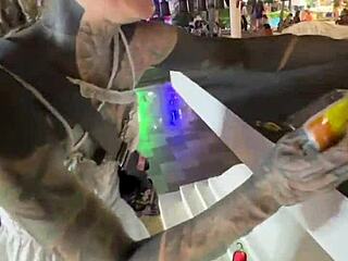 A quirky thai lady feeds stray cats in crazy thailand scene