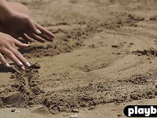 Small tits milf poses seductively on sunny beach