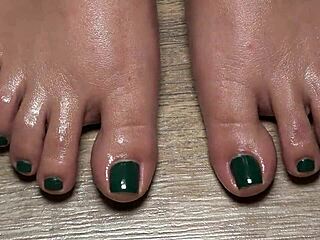 close up green nail toes for fetish fun