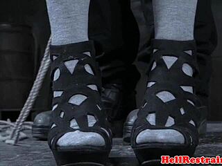 restrained sub's nipples waxed close-up while maledom whips hard