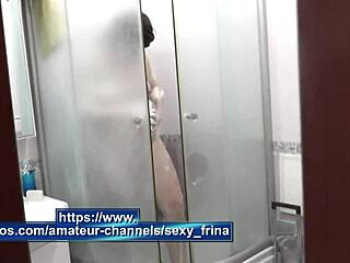 frina's wet shower tempts doorway voyeur's phone lens