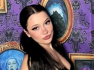 pigtails goth strips bra in haunted house tunes playing