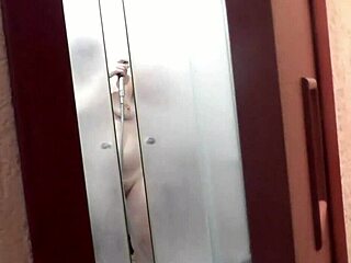 frina's wet shower tempts doorway voyeur's phone lens