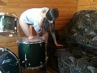 Petite Teen Fucks Tight Pussy with Big Dildo on Drumset