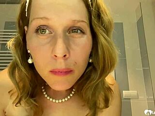 next door brunette milf strips teasing her huge fake tits homemade