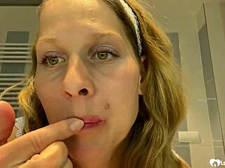 next door brunette milf strips teasing her huge fake tits homemade