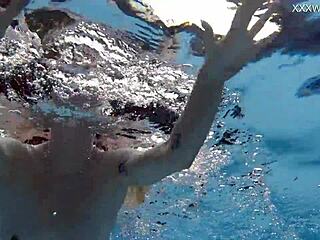 Finnish pornstar Mimi Cica strips naked underwater casually