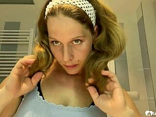 next door brunette milf strips teasing her huge fake tits homemade